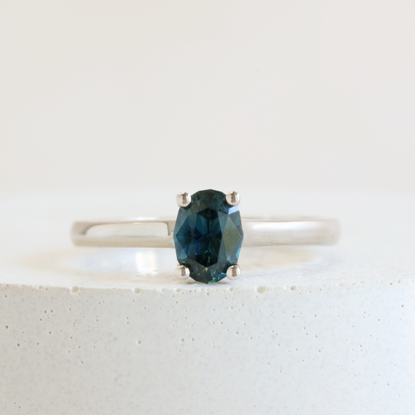 0.62 ct Deep Ocean Blue Oval Traditional Love Note Solitare