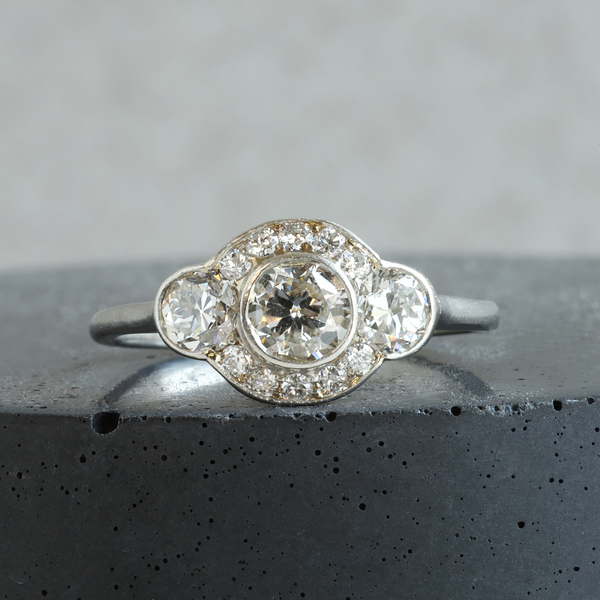 Ethical Jewellery & Engagement Rings Toronto - FTJCo Vintage Three Stone Partial Halo Ring in Platinum - FTJCo Fine Jewellery & Goldsmiths