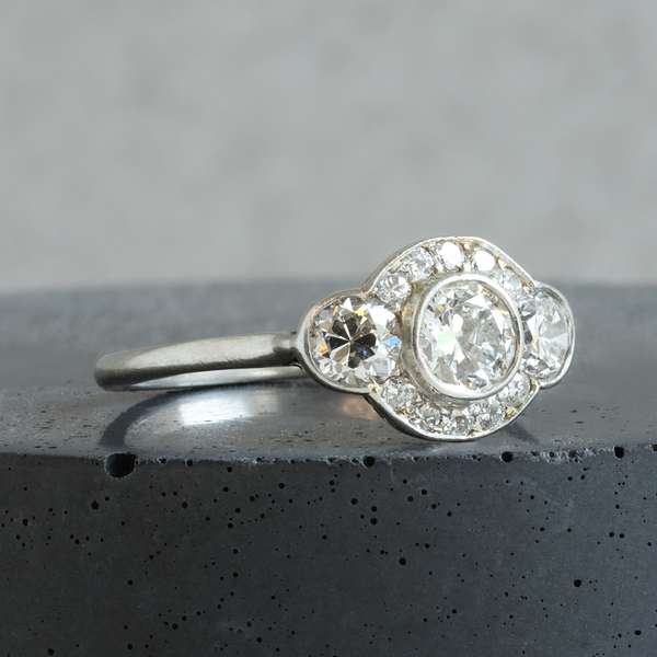 Ethical Jewellery & Engagement Rings Toronto - FTJCo Vintage Three Stone Partial Halo Ring in Platinum - FTJCo Fine Jewellery & Goldsmiths