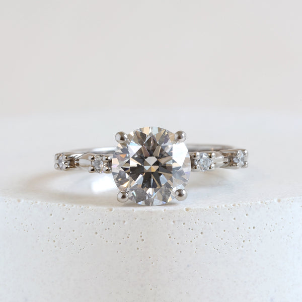 Pre-Loved 1.58 ct H VS2 Jasmine Round Cut Ring in White Gold