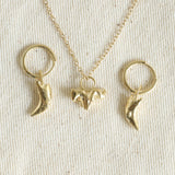 Ethical Jewellery & Engagement Rings Toronto - Puppy Teeth Charms - FTJCo Fine Jewellery & Goldsmiths