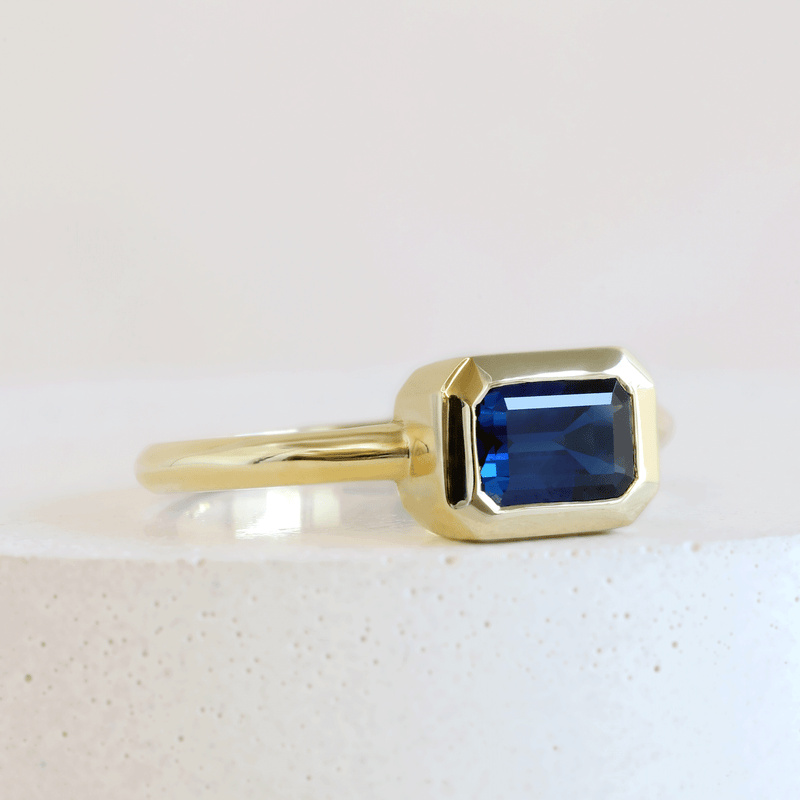 Ethical Jewellery & Engagement Rings Toronto - 1.21 ct Deep Water Blue Customized Rectangular Wren Bezel Ring in Yellow Gold - FTJCo Fine Jewellery & Goldsmiths