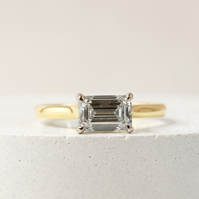 1.09 ct Horizontal Emerald-cut Bi-Colour Love Note with Partial Hidden Halo in Yellow and White Gold