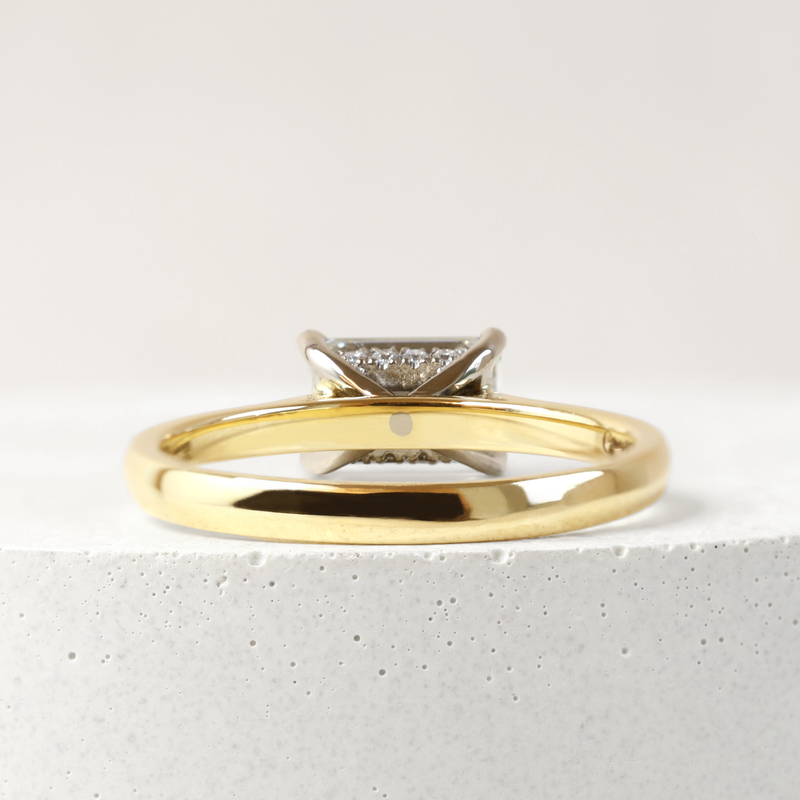 1.09 ct Horizontal Emerald-cut Bi-Colour Love Note with Partial Hidden Halo in Yellow and White Gold