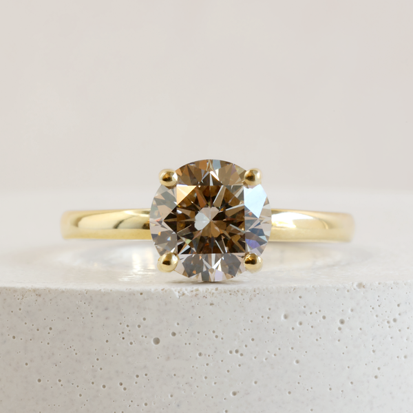 1.51 ct Warm Grey Pietra Round Solitaire in Yellow Gold