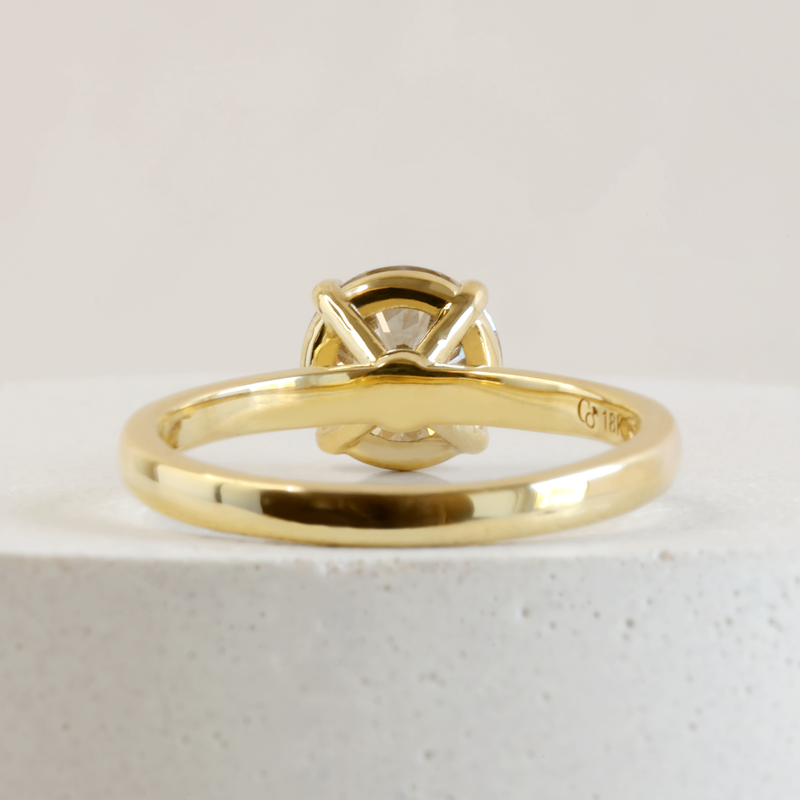 1.51 ct Warm Grey Pietra Round Solitaire in Yellow Gold