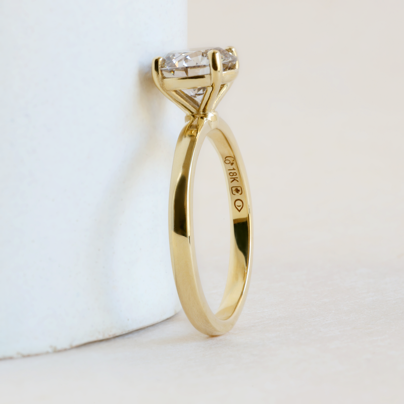 1.51 ct Warm Grey Pietra Round Solitaire in Yellow Gold