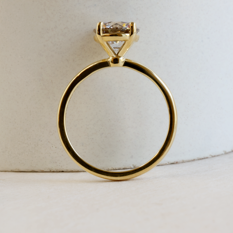 1.51 ct Warm Grey Pietra Round Solitaire in Yellow Gold