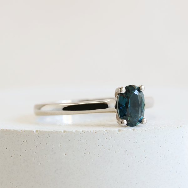 0.62 ct Deep Ocean Blue Oval Traditional Love Note Solitare