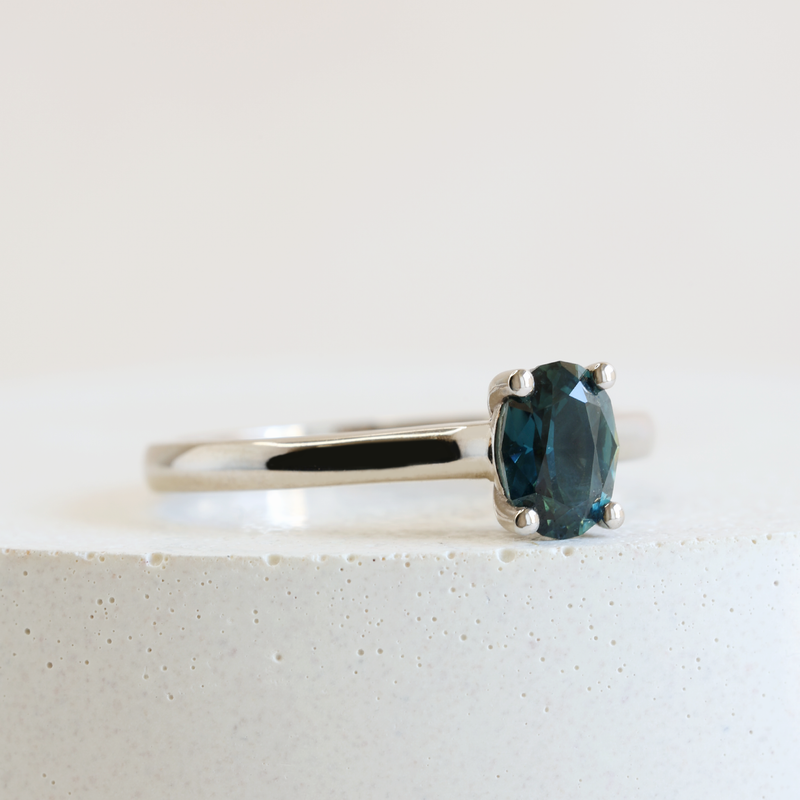 0.62 ct Deep Ocean Blue Oval Traditional Love Note Solitare
