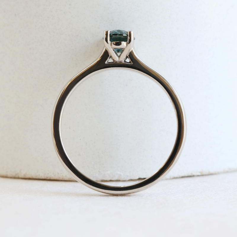 0.62 ct Deep Ocean Blue Oval Traditional Love Note Solitare