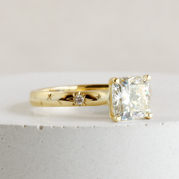 1.30 ct G VVS2 Cushion Love Note Solitaire with Stars in 18K Yellow Gold