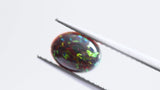 0.77 ct Black Colourplay Oval Chatham Grown Opal