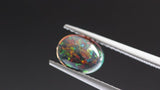 0.77 ct Black Colourplay Oval Chatham Grown Opal
