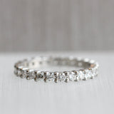 Ethical Jewellery & Engagement Rings Toronto - Shared Claw Platinum Diamond Eternity Band - Fairtrade Jewellery Co.