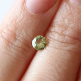 Ethical Jewellery & Engagement Rings Toronto - 0.48  ct AKARA Certified Round Citrus Green Sapphire - Fairtrade Jewellery Co.