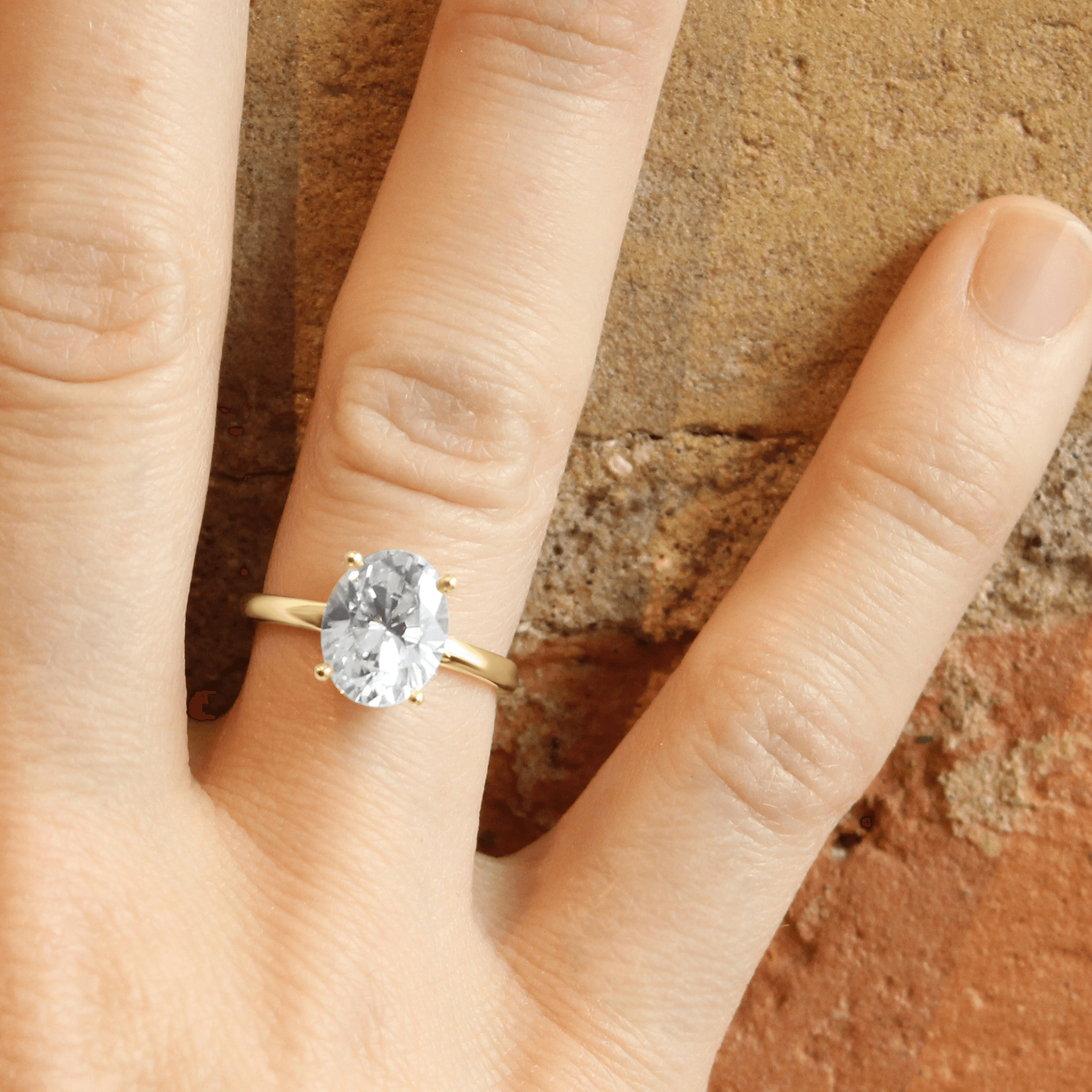 Low setting 2025 oval engagement ring
