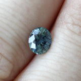 Ethical Jewellery & Engagement Rings Toronto - 0.88 ct Teal Blue Oval Modified Brilliant Montana Sapphire - Fairtrade Jewellery Co.